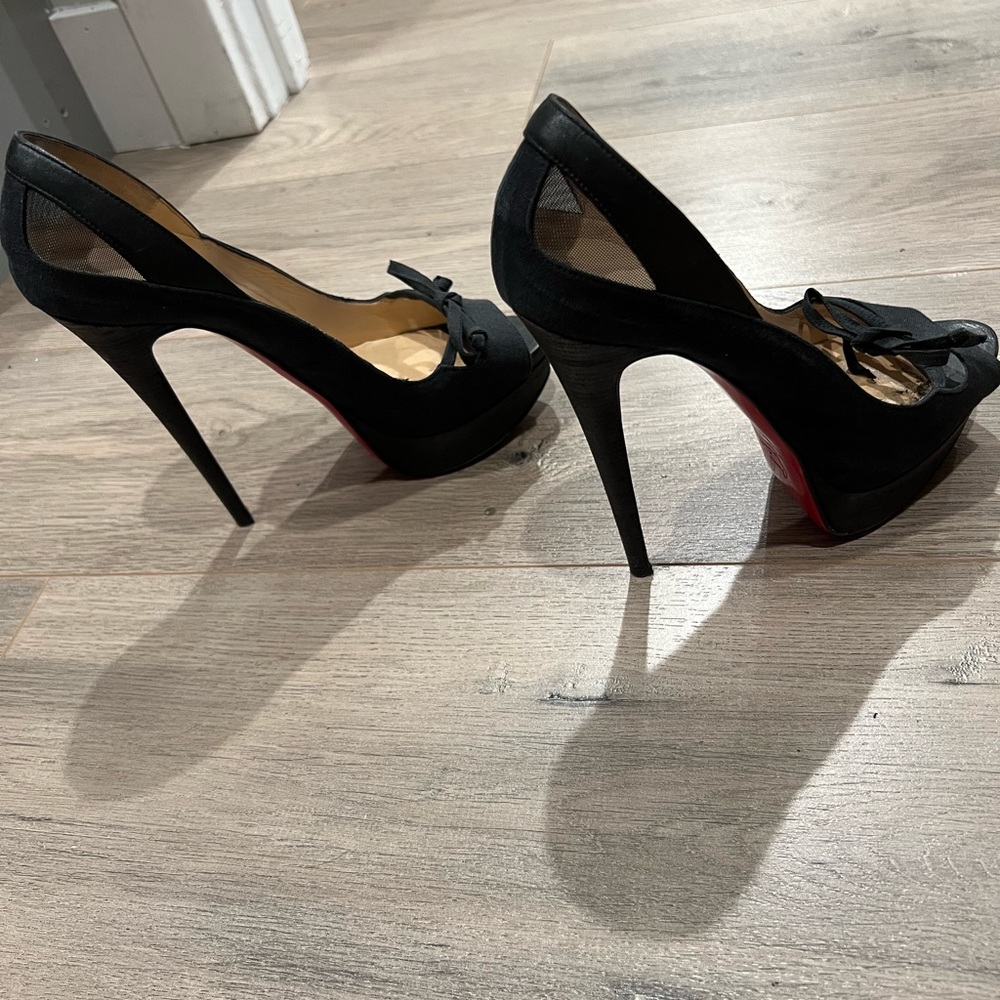 Christian Louboutin: 5 3/4 heel; size 38.5